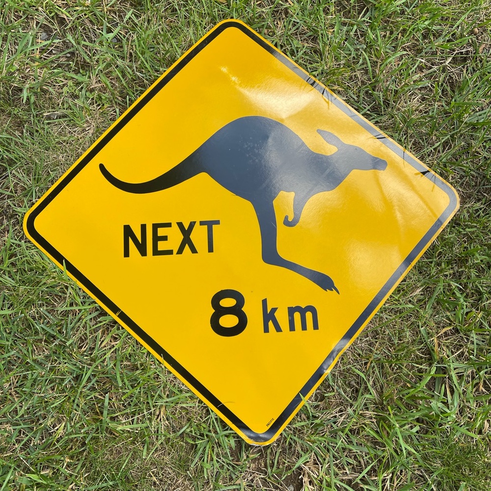 Vintage pacific kangaroo sign next 8km 17 3/4”